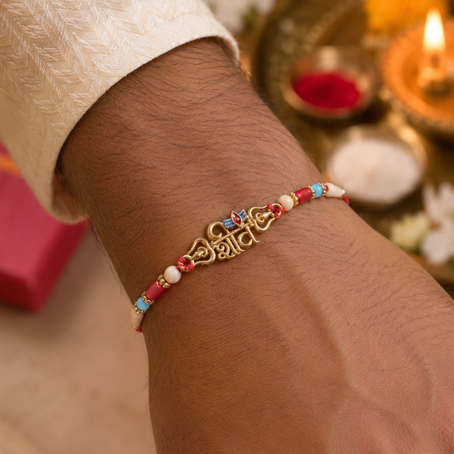 Shiv Script Pendant Rakhi with Blue Trishul Accent and Pearl Beads
