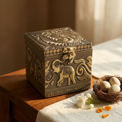 Vintage-style latch securing brass storage box