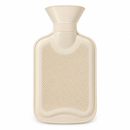 A cream hot water bottle with a ribbed texture on its surface stands upright against a white background.