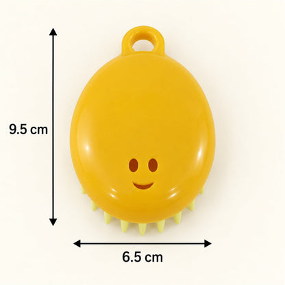 A yellow silicone scalp brush with light green bristles is displayed with measurements of 9.5 cm and 6.5 cm.