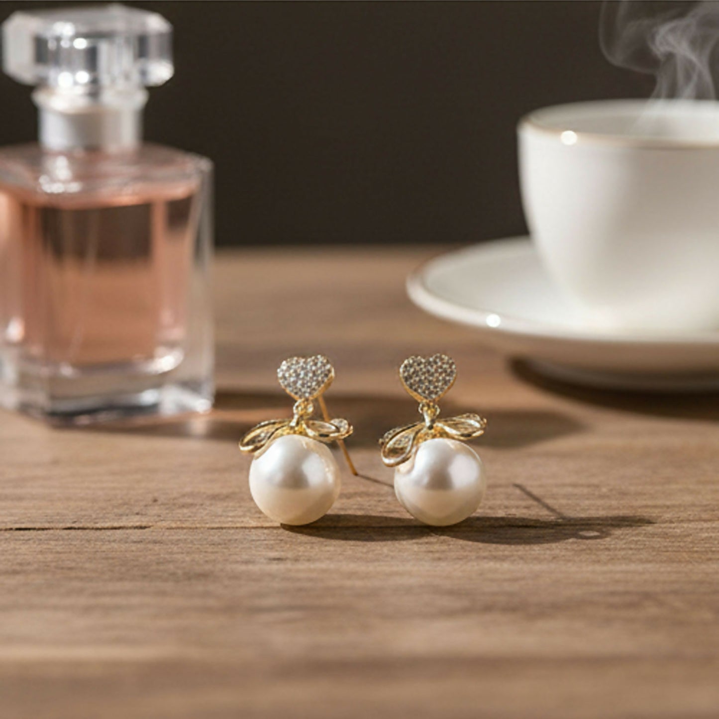 Heart Crystal and Pearl Bow Earrings worn by model