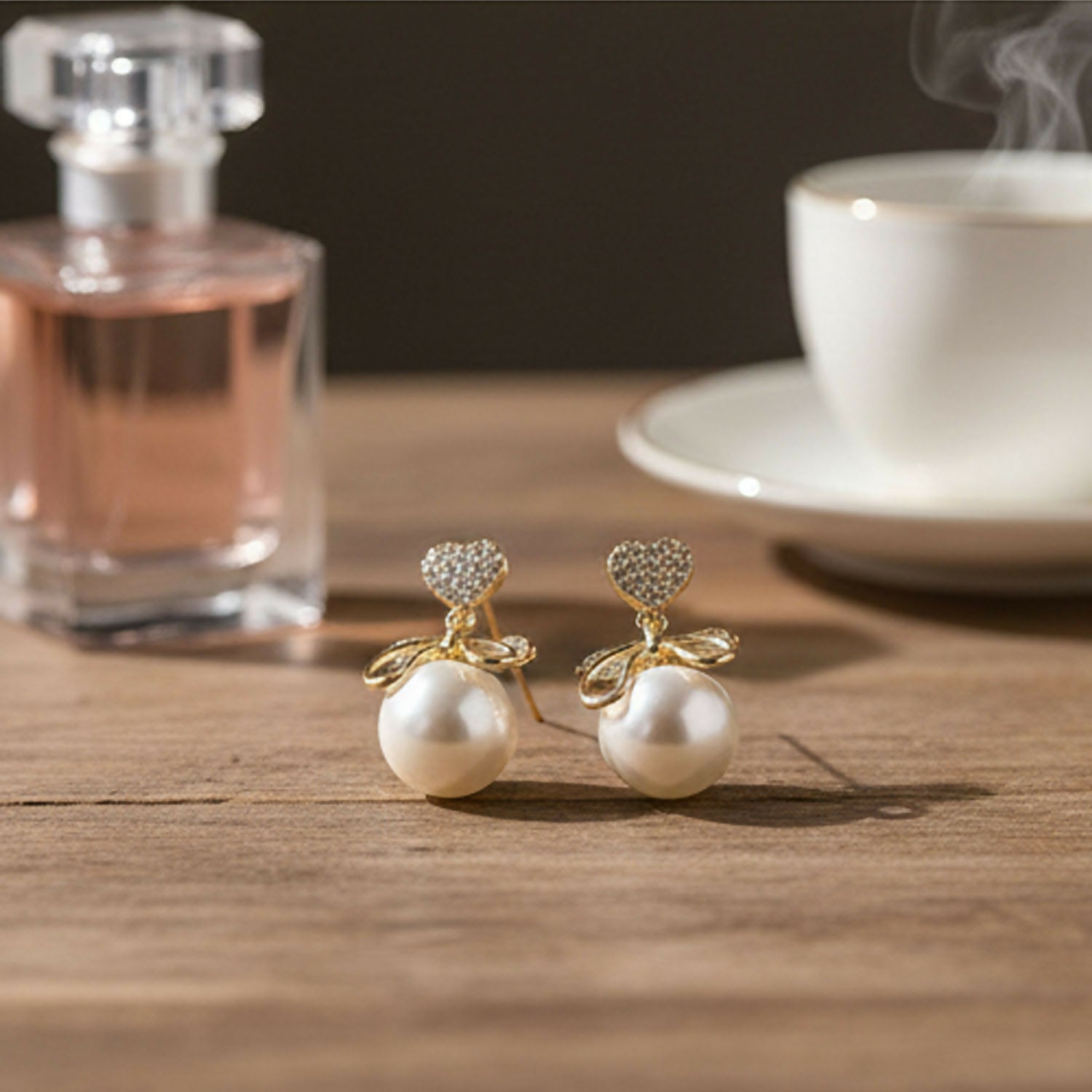 Heart Crystal and Pearl Bow Earrings worn by model