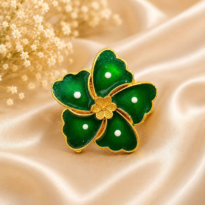 Close-up of the stylish green floral ring, ideal for party wear.