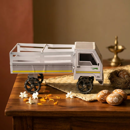 Miniature cargo truck toy showing side view with realistic decals
