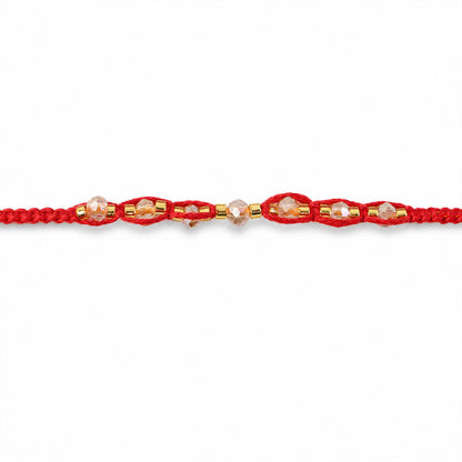 Red Braided Rakhi with Crystal Bead Pendant and Golden Accents