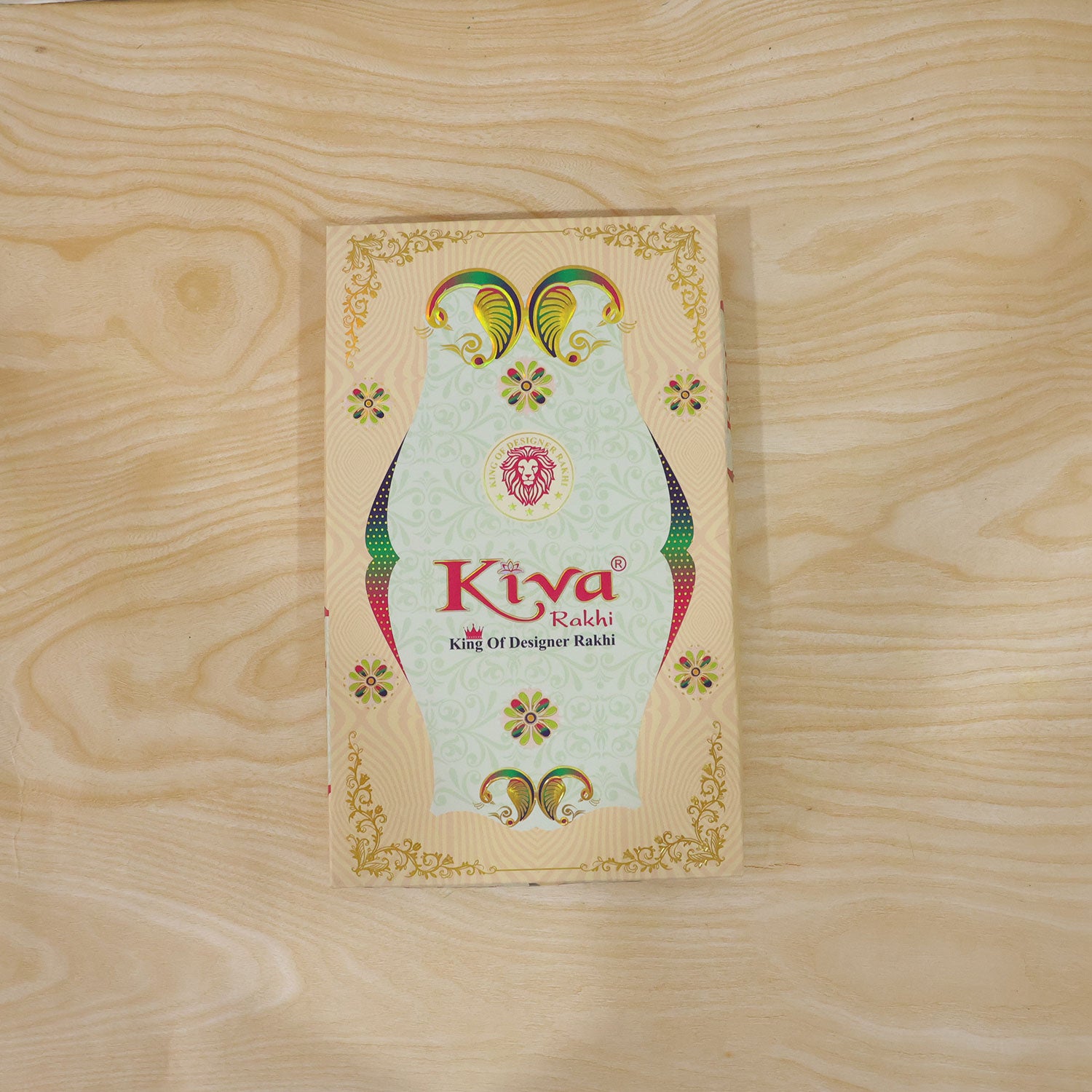 Multicolor Floral Chakra Rakhi with Pearl Beads, Roli Chawal Coin and Peacock Card Packing