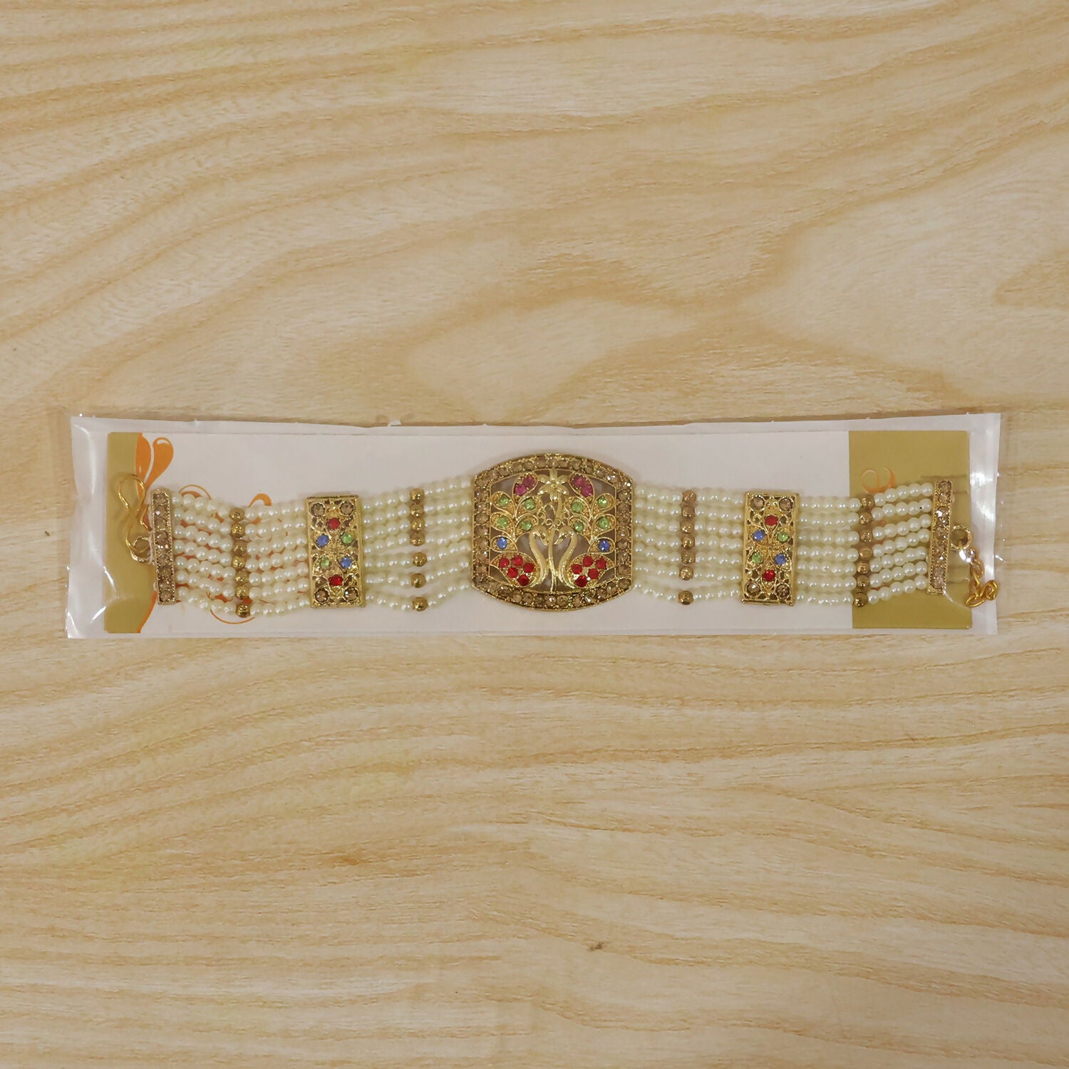 Bridal bracelet featuring pearls and colorful stones in floral pattern
