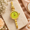 Elegant Gold Tone Bracelet Watch with Round Quartz Dial and Decorative Bead Accent