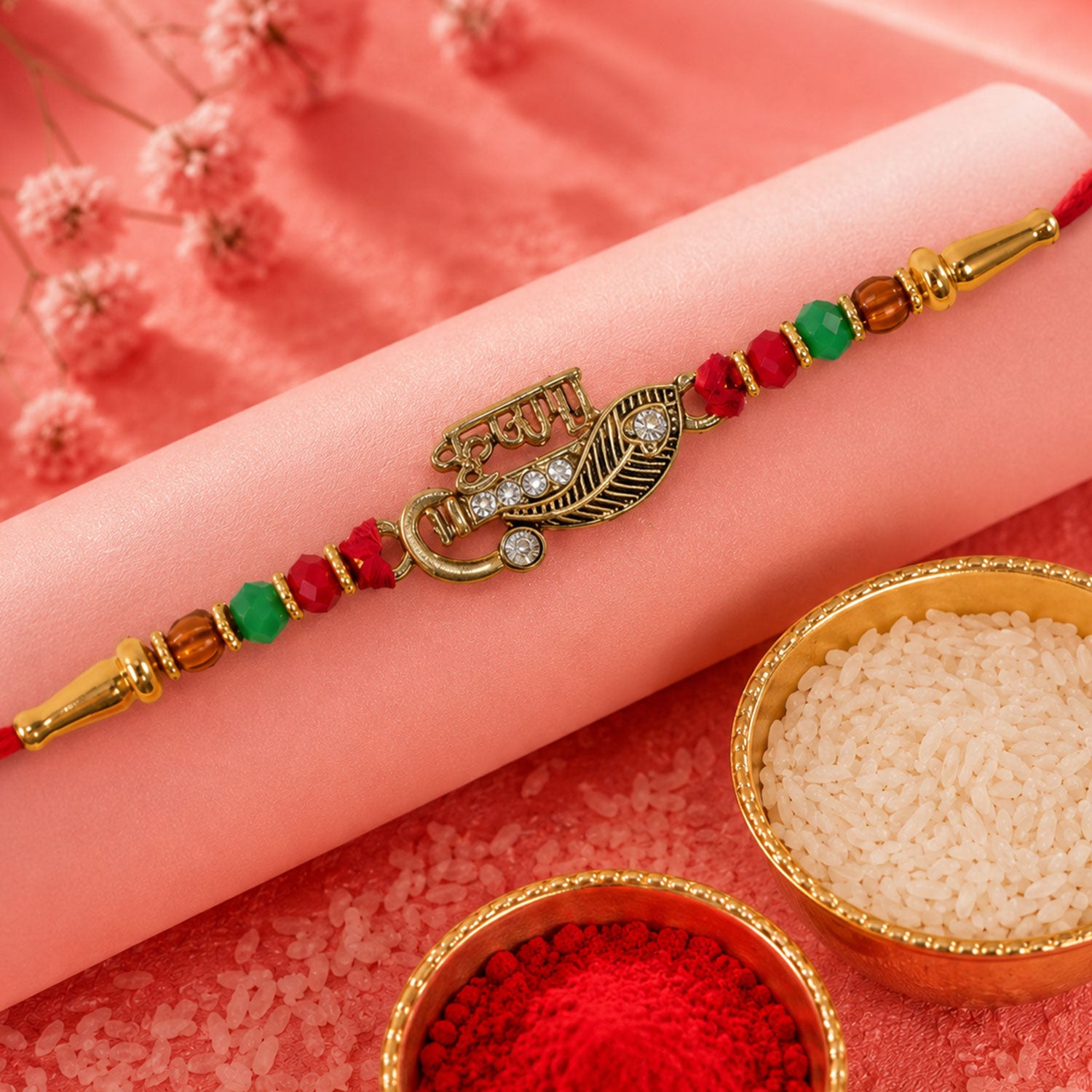 Veera Name Rakhi with Flute Leaf Style Centre, Stones and Red Green Beads