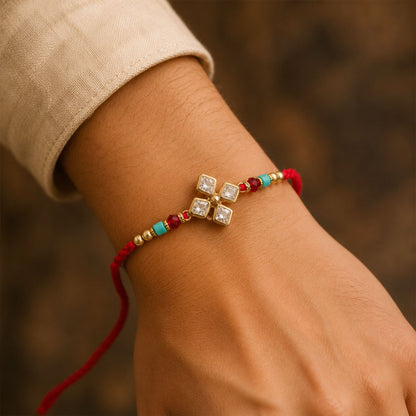 Diamond Flower Crystal Rakhi with Turquoise Beads, Roli Chawal Coin and Gift Box Packing