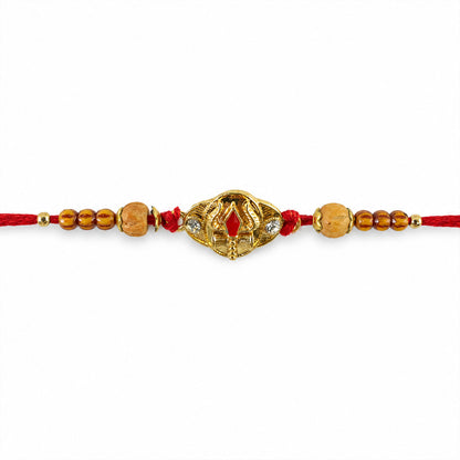 Tilak Trishul Golden Devotional Rakhi with Wooden Beads and Traditional Red Thread