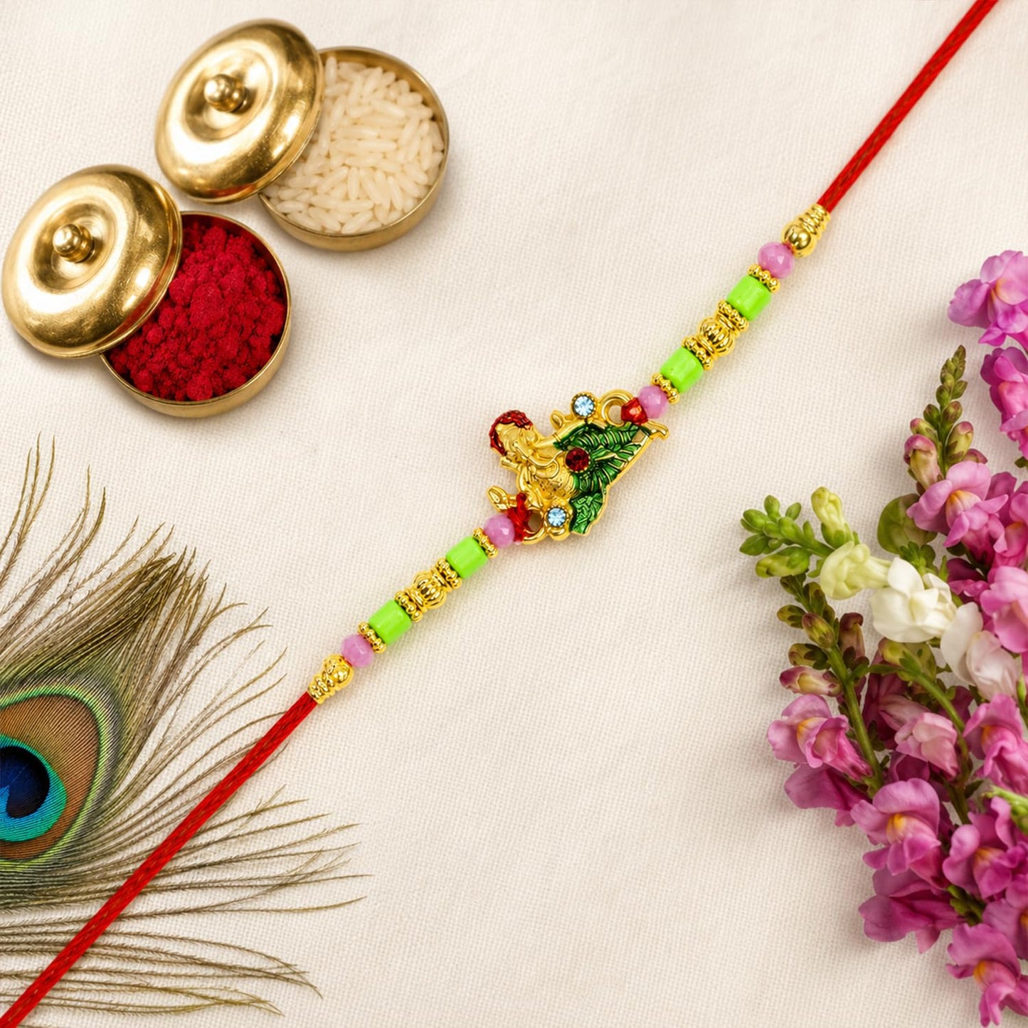 Ganesha charm Rakhi for Brother with Emperor Choco, Roli Tikka & Card, Pack of 6