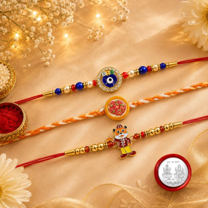 Rakhi Set for Brother (Set of 7) – Cute Design, Strawberry & Evil Eye Rakhi Combo with Chocolate, Roli Chawal, Silver Color Coin & Greeting Card – Raksha Bandhan Pack (K3_1667+1131+1018_BS96)