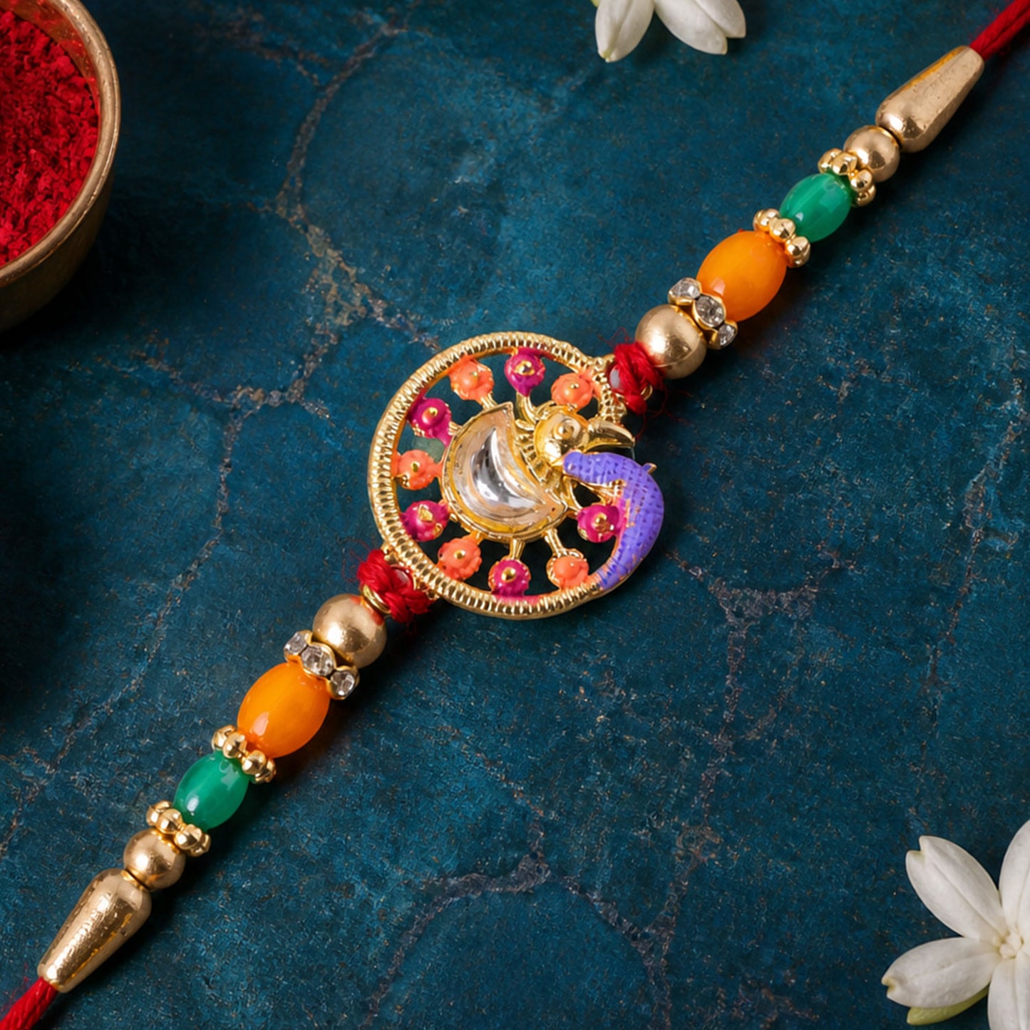 Traditional Rakhi with Round Sacred Medallion, gold trims and chain look for Gift Use