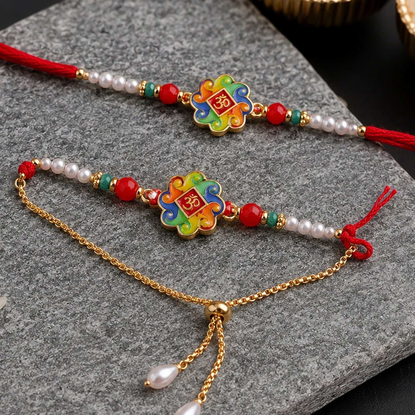 Elegant Om Symbol Rakhi with pearl beads and soft red thread