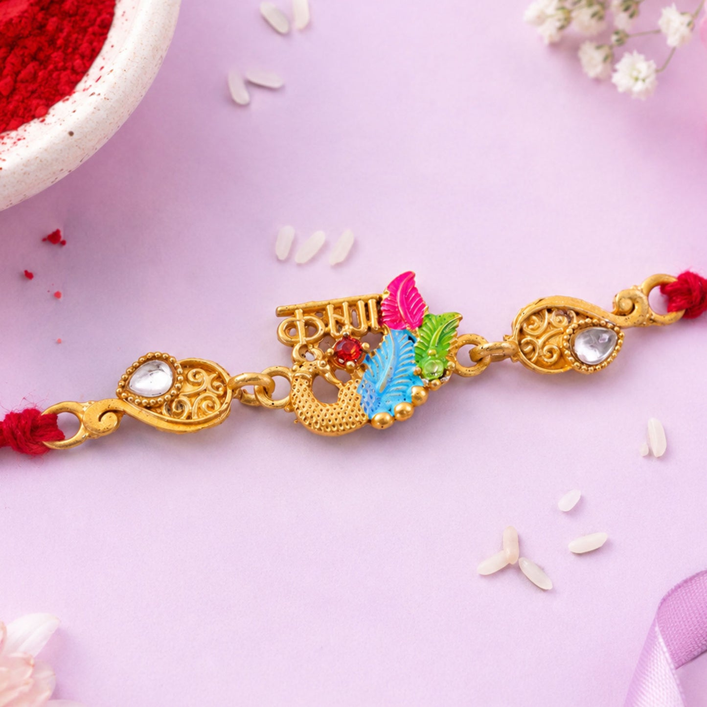 Designer Rakhi with Decorative Floral Medallion, gold trims and chain look for Gift