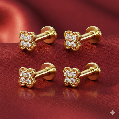 Close-up of the flat back design on the gold plated clover stud earrings for comfort