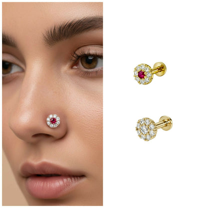 Close-up of elegant ruby floral halo nosepin stud showing intricate gold plated design