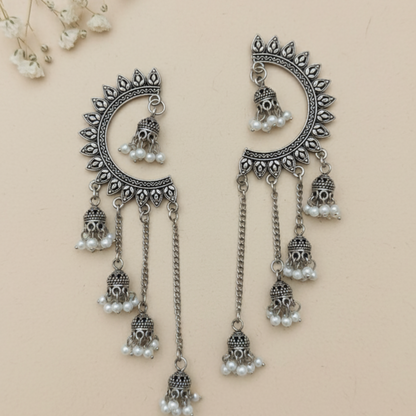 Oxidized Crescent Chandbali Earrings Featuring Long Jhumka Chains and Classic White Pearl Embellishments