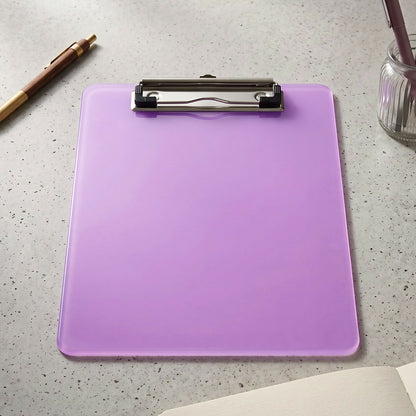 A translucent purple plastic clipboard with a silver metal clip sits on a light grey textured surface.