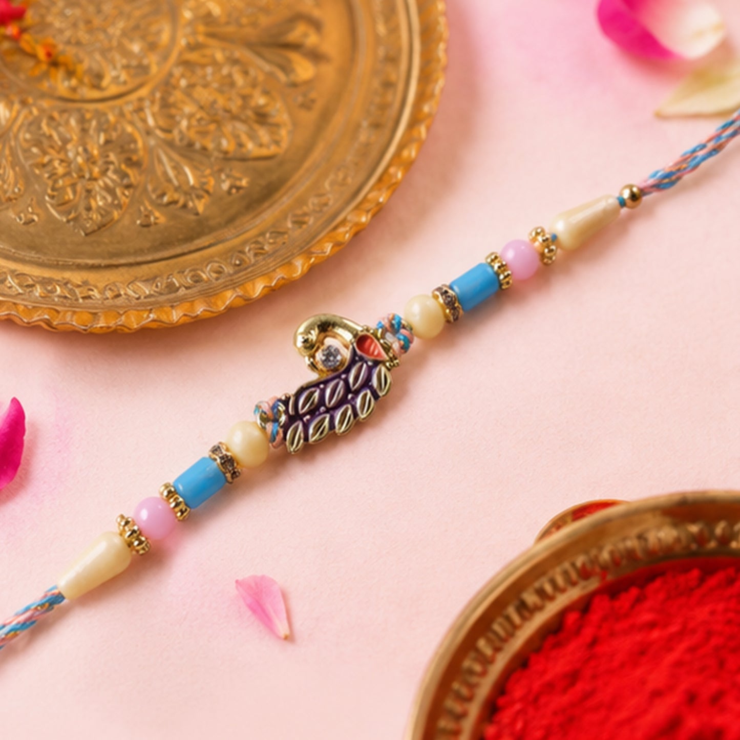 Blue Enamel Peacock Pendant Rakhi with Pastel Beads