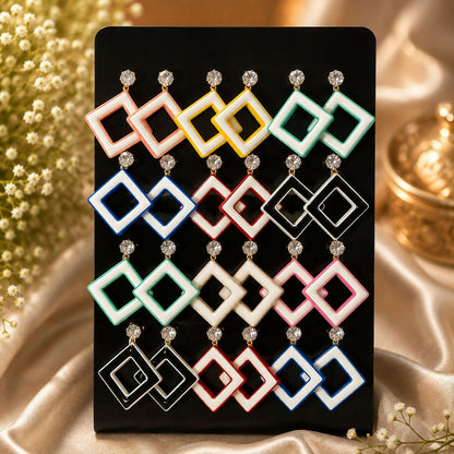 Colorful geometric drop earrings set with sparkling crystal studs.