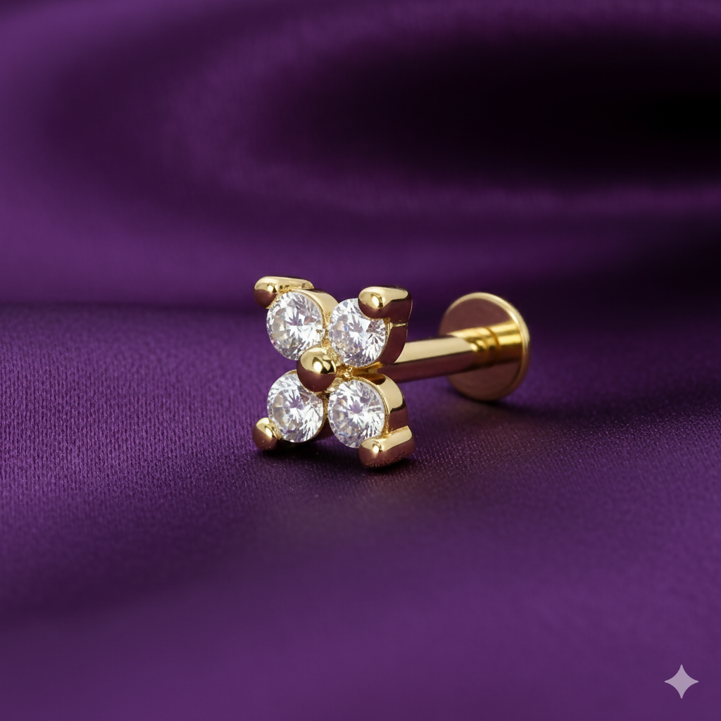 Close-up of gold plated AD flower nosepin highlighting flat back post for comfortable wear