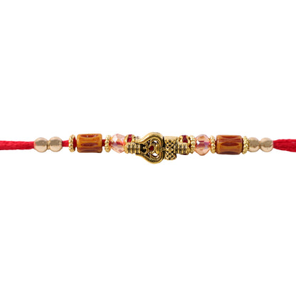 Red Thread Rakhi with Amber Beads and Antique Gold Lantern Charm