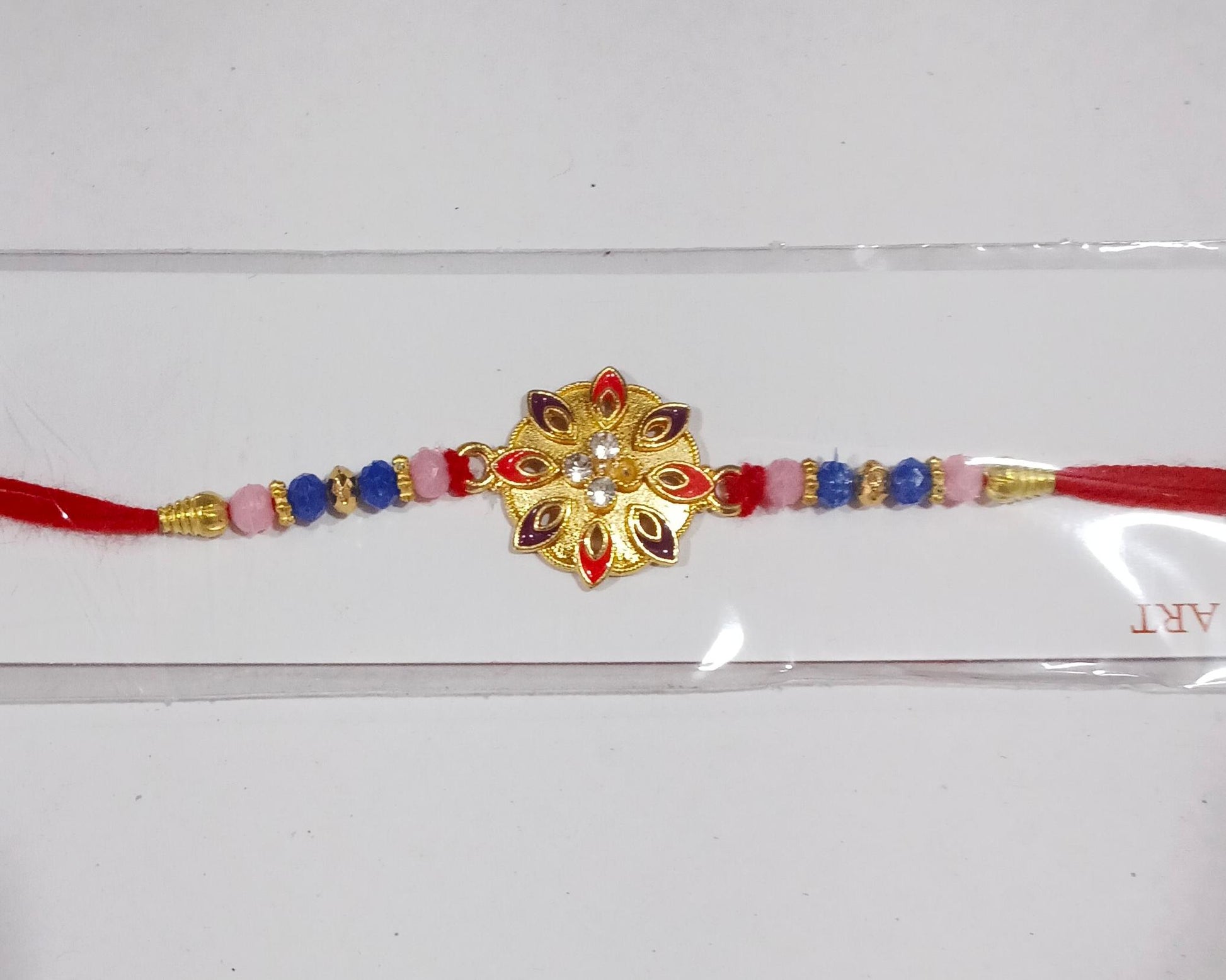Assorted floral rakhis with beads and thread colors