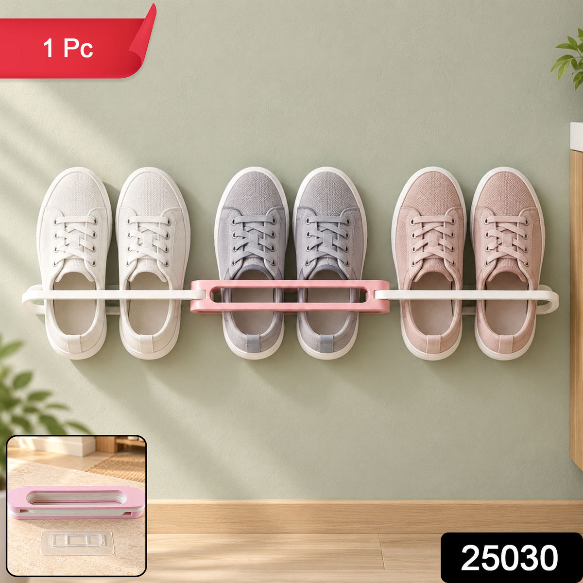 A pink and white folding shoe rack holds three pairs of sneakers on a light green wall. – view 8