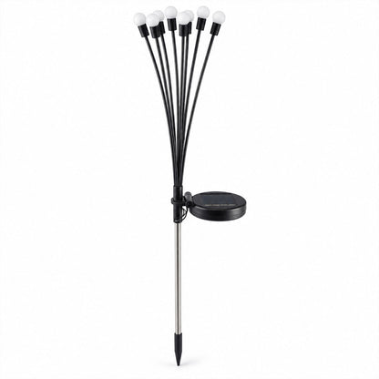 A single solar firefly light with eight white orbs and a solar panel on a silver stake, against a plain white background.
