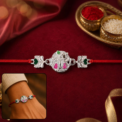 Silver Shrinathji Rakhi with Pink Green Stones and Elephant Charms