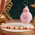 Goden Floral Pearl Beads Crystal Designer Rakhi with Cute Doll Keychain Combo (2 Pc)