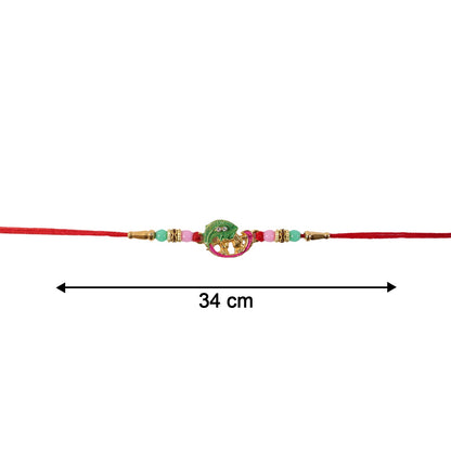 Side view of Mini Krishna Peacock Leaf Rakhi showcasing details