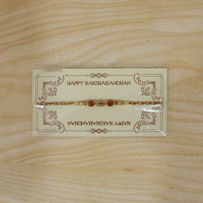 Graceful Pastel Pearl Rakhi with Fine Beads and Premium Raksha Bandhan Charm