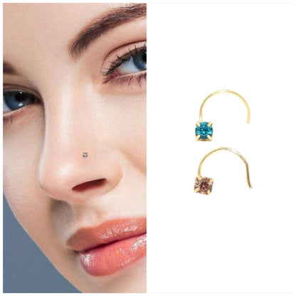 Close-up view of gold plated nosepin featuring Champagne Brown solitaire crystal