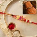 Designer Rakhi with Beads & Pearl Detail – Elegant & Festive