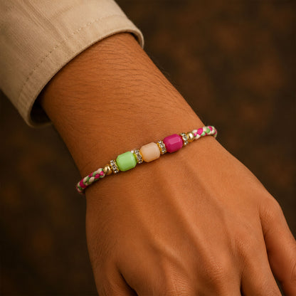 Bright Macrame Bracelet Rakhi with Green Peach Pink Beads and Colorful Thread