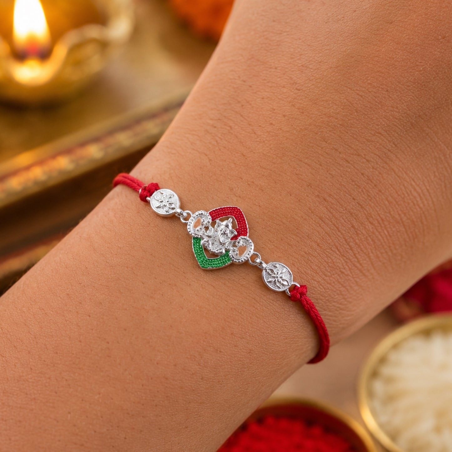 Silver Green Floral Rakhi with Red Thread and White Side Charms