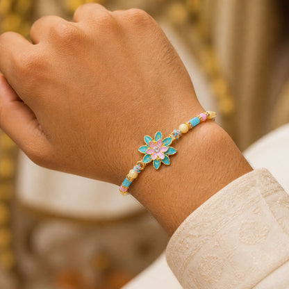 Designer Rakhi featuring Lotus Charm, bead line and gift style for Retail Display