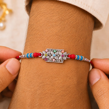 Rectangular Pearl Crystal Rakhi with Red Blue Beads, Roli Chawal Coin and Gift Packing
