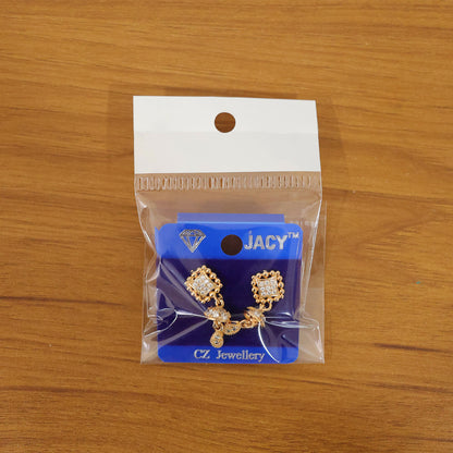 Front view of lightweight gold Jhumka drop earrings with sparkling crystal details