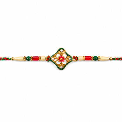 Green Enamel Kite Shaped Pendant Rakhi with Red Flower Center