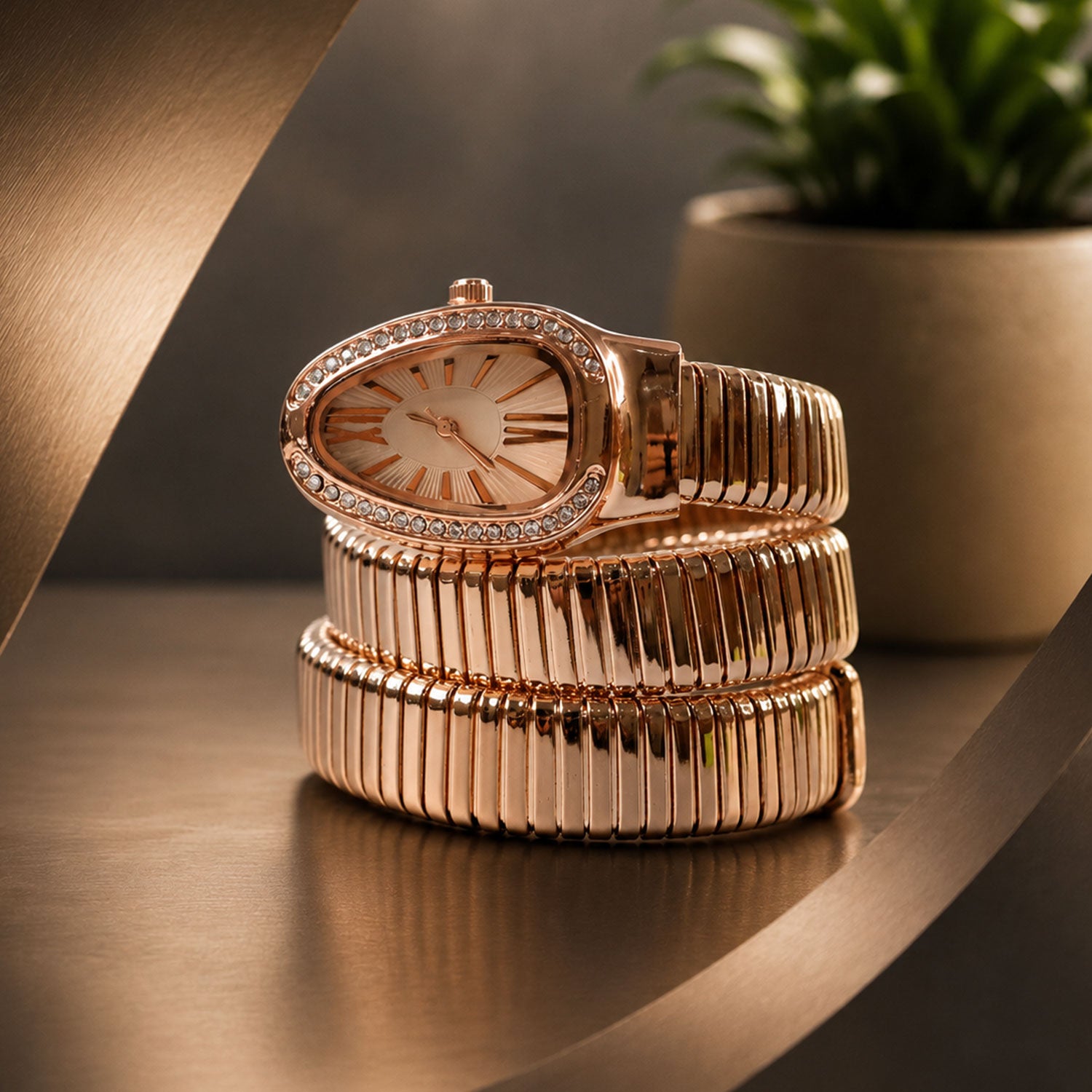 Rose Gold Oval Snake Style Bracelet Watch with Crystal Dial Border Design