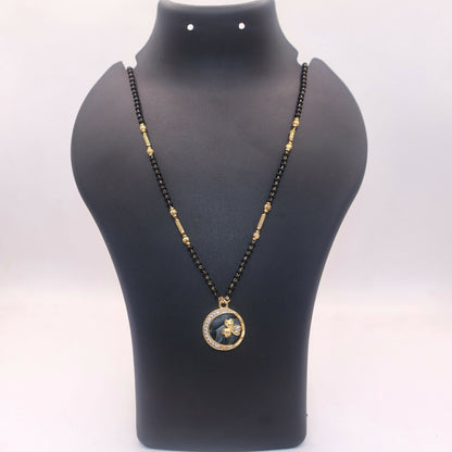 Black beads chain with gold spacers in butterfly coin pendant mangal sutra