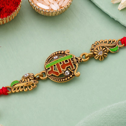 Antique Gold-Toned Ram Rakhi with Crystal Accents, Green Enamel & Designer Red Thread