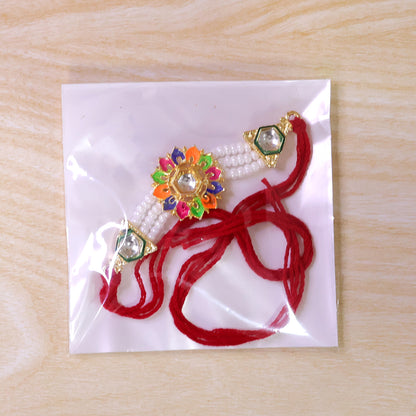 Multicolor Pearl Floral Rakhi with Jewel Center and Bright Festive Gifting Elegance