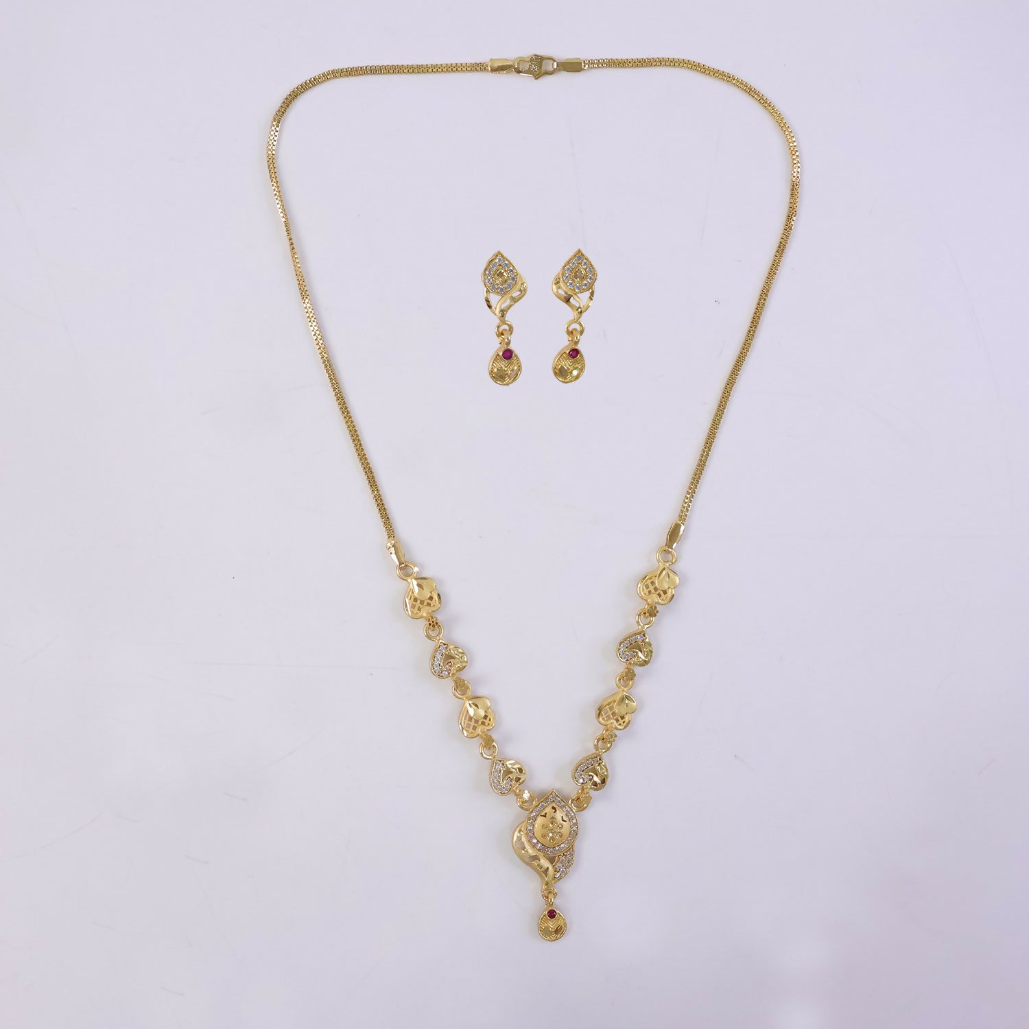 Elegant Gold-Tone Heart Motif Necklace Set with Designer Pendant & Matching Drop Earrings