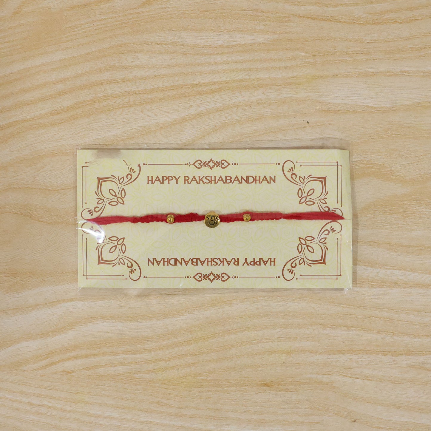 Elegant Stone Work Rakhi with Red Thread, Bead Detailing and Premium Celebration Look