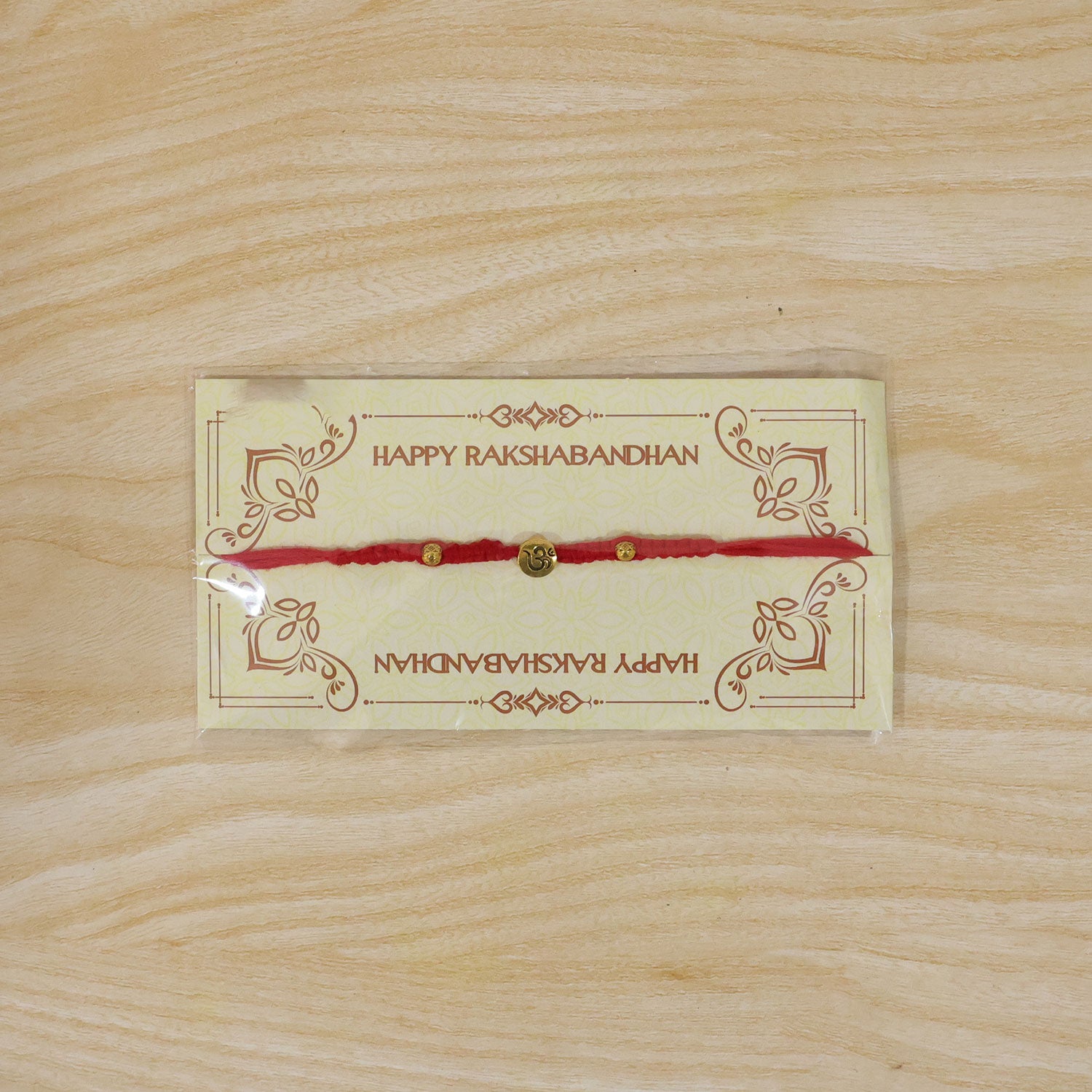 Elegant Stone Work Rakhi with Red Thread, Bead Detailing and Premium Celebration Look